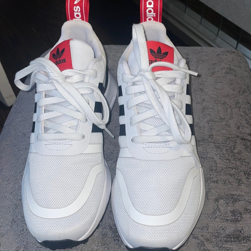 Worn once light mark barley visible on front left shoe seen in picture.